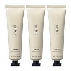 Front view of Koyuji toothpaste pack with three tubes