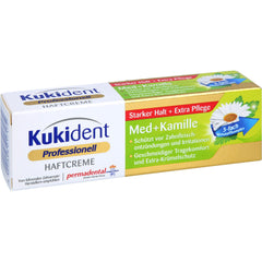 Application of denture adhesive cream on dentures
