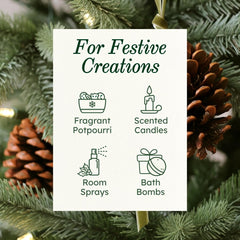 Pine needles and cedarwood essential oils arranged for holiday fragrance