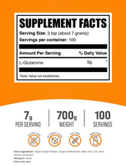 Serving size image showing 7 g dose of L-Glutamine powder in Sour Green Apple flavor