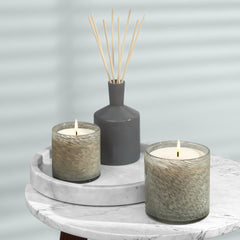 Lifestyle setting featuring Paradiso Fig candle in home decor