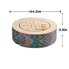 Person sitting on moxibustion cushion for relaxation