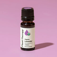 GC-MS report next to Organic Lavender Essential Oil bottle