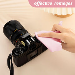 Cleaning phone screen and camera lens with pink microfiber cloth