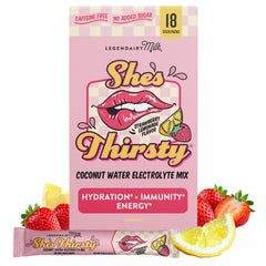 Front close-up of Legendairy Milk She's Thirsty Strawberry Lemonade hydration packets, 18 count