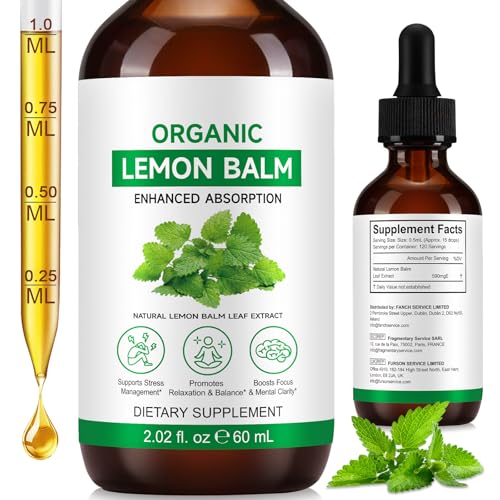 Dropper dispensing Lemon Balm tincture from a glass bottle