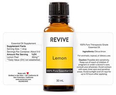 Lemon essential oil bottle label showing 100% Pure Therapeutic Grade