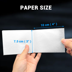 Lens cleaning tissue paper in use on optical surface