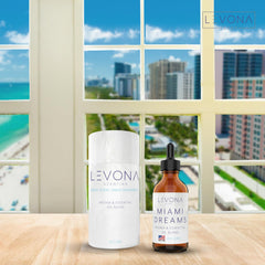 Bottles showing bergamot and pine notes for Miami Dreams