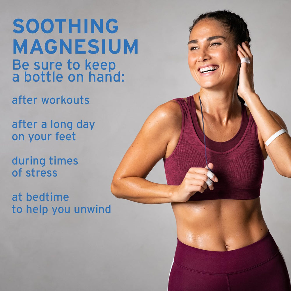 Person applying magnesium oil roll-on to leg after sports