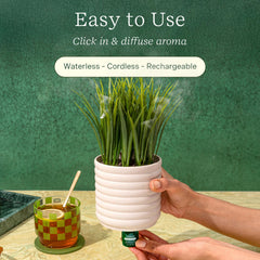 Diffuser planter with faux greenery in modern space