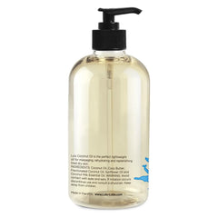 Pouring Lulu Coconut Massage Oil showing silky non-greasy texture