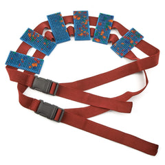 User wearing Lyapko acupuncture belt for massage therapy