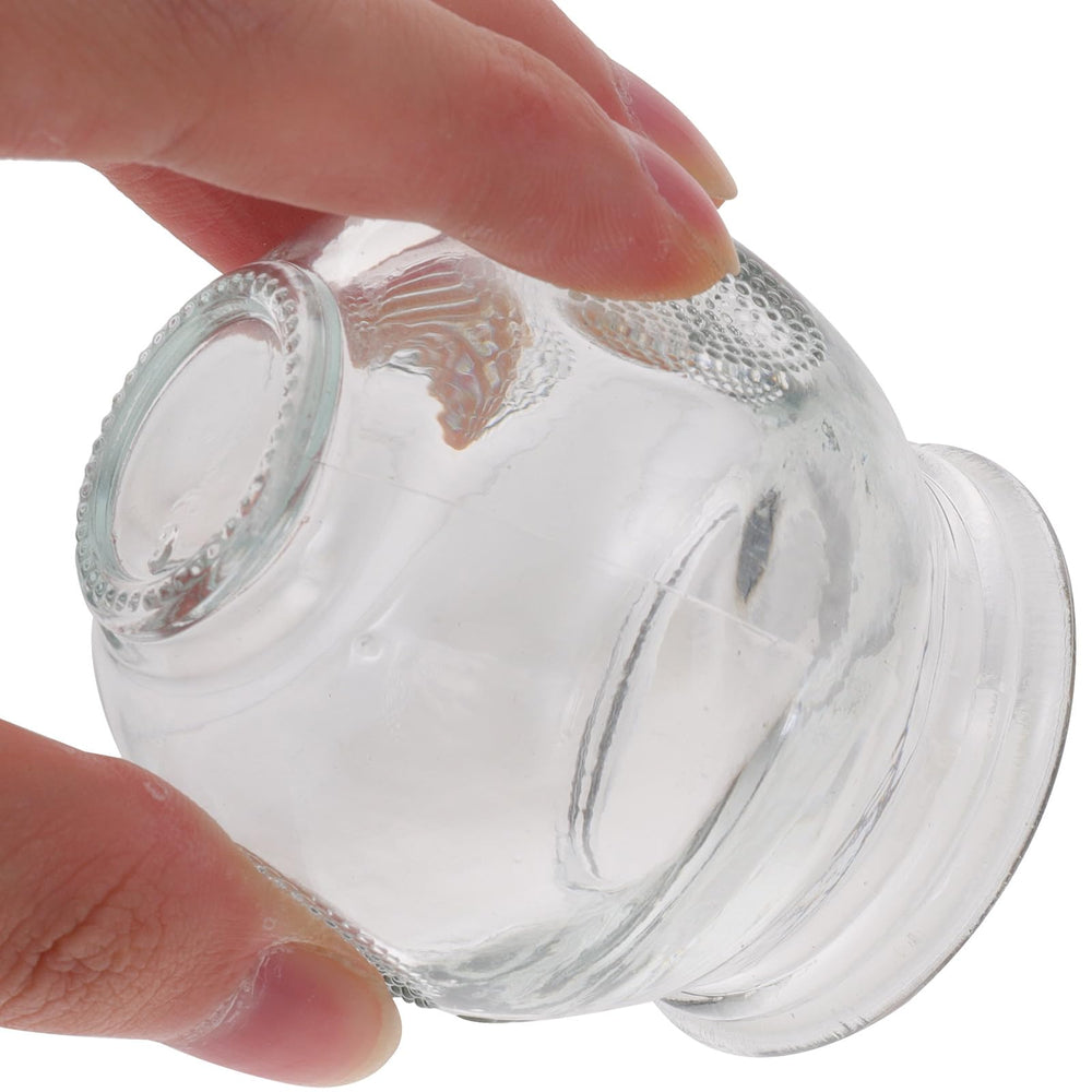 Set of six glass cupping cups for massage