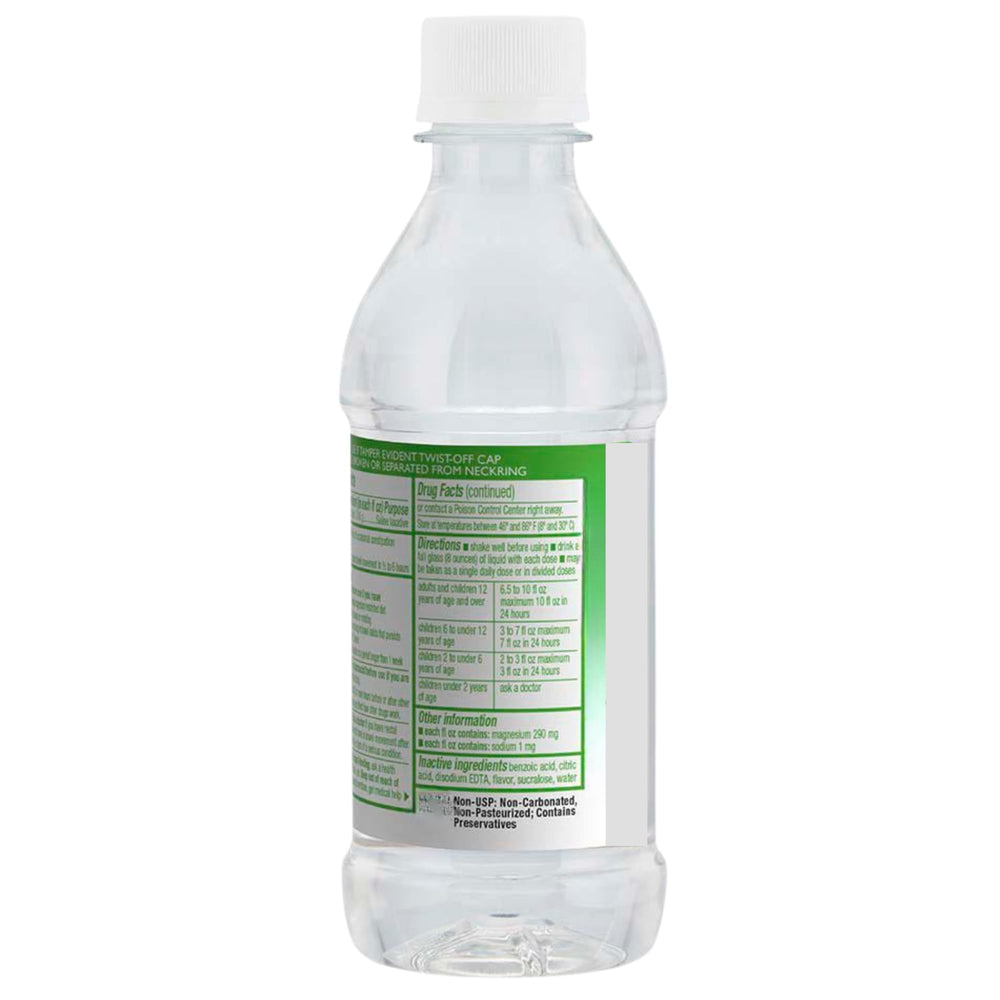 Pouring lemon-flavored Magnesium Citrate Solution into a glass