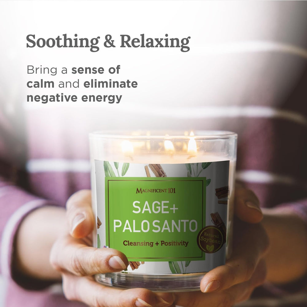 Candle burning with a calming flame, symbolizing cleansing of negative energy