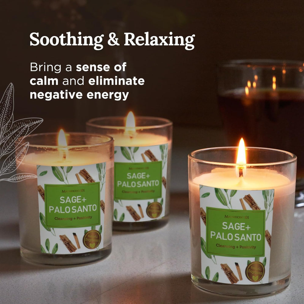 Soft glow of Sage and Palo Santo candles burning for energy cleansing