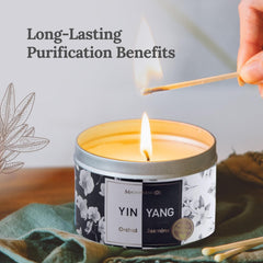 Close-up of Yin Yang symbol on candle tin