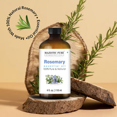 Close-up of rosemary essential oil droplet from amber bottle