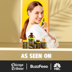 Pouring MAJU Black Seed Oil from the bottle