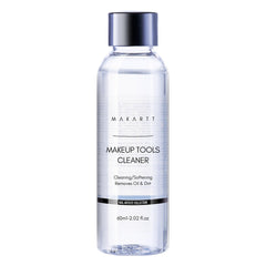 Makartt Brush Cleaner Solution bottle on vanity for quick residue removal