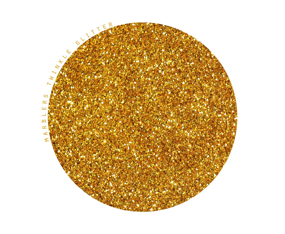 MARBLERS Twinkle Glitter Honey Gold applied on face for a safe makeup look.