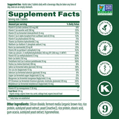 Close-up: two daily tablets inside MegaFood Men's 40+ bottle