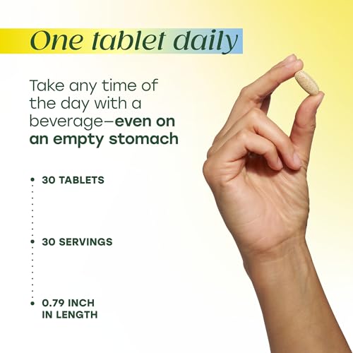 MegaFood One Daily Men's Multivitamin bottle with glass and water, easy daily intake.