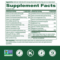 Close-up of a MegaFood 55+ tablet beside bottle