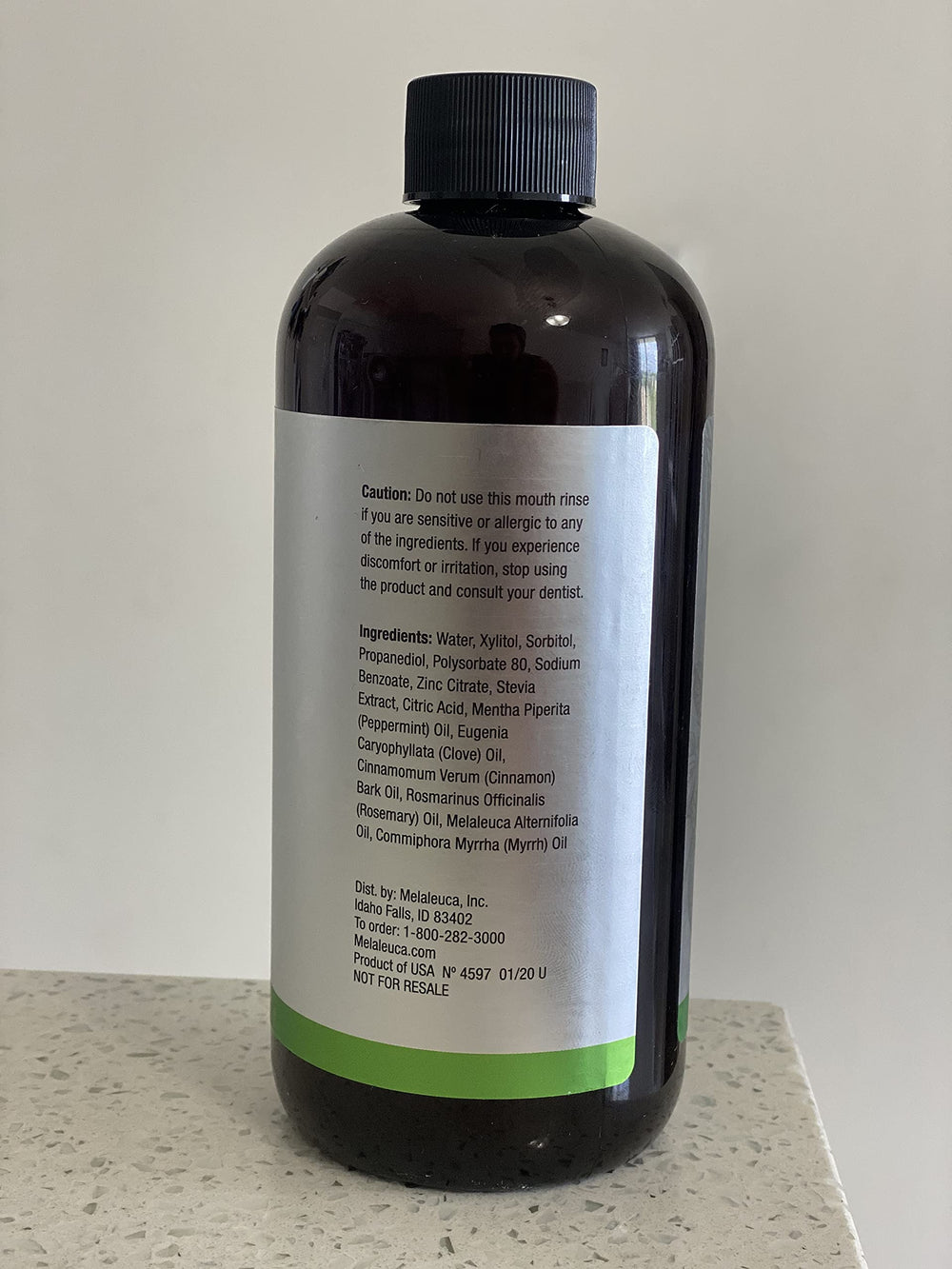 Breath-Away Mouth Rinse bottle highlighting peppermint, cinnamon, clove, rosemary and T36-C5 oil