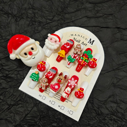 MellowBells Christmas Wonderland nails featuring red and white 3D Santa design for festive parties.