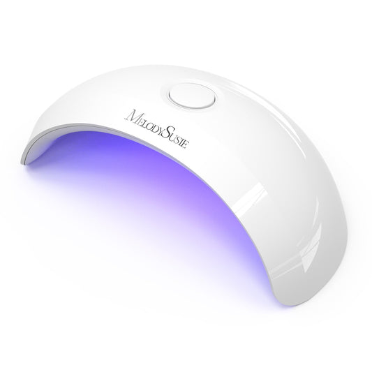 MelodySusie pocket-sized LED UV nail lamp, front view, quick curing in compact footprint.