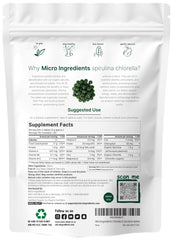 Close-up of spirulina and chlorella tablets highlighting cracked cell wall