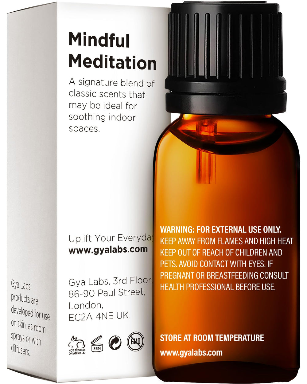 Close-up of dropper releasing Mindful Meditation Essential Oil Blend