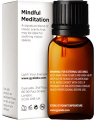 Close-up of dropper releasing Mindful Meditation Essential Oil Blend