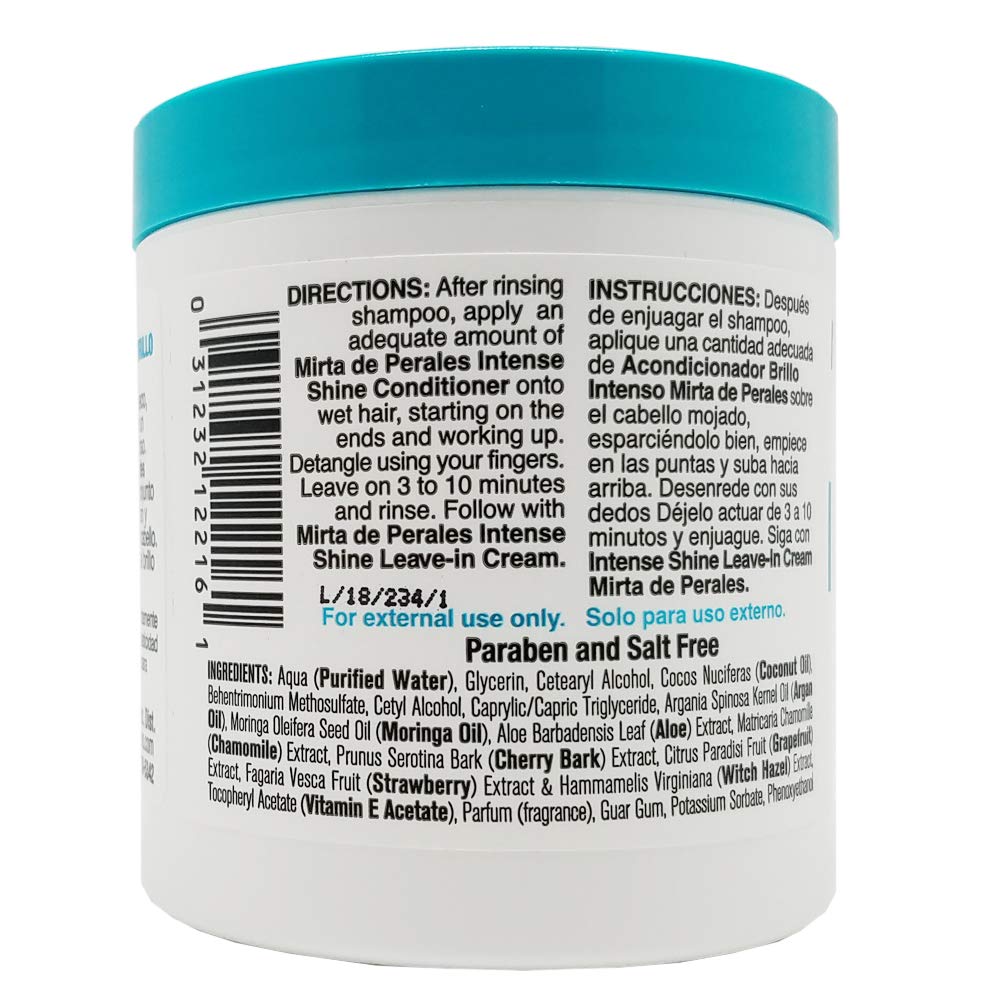 Conditioner bottle highlights coconut oil for smooth, frizz-free ends.