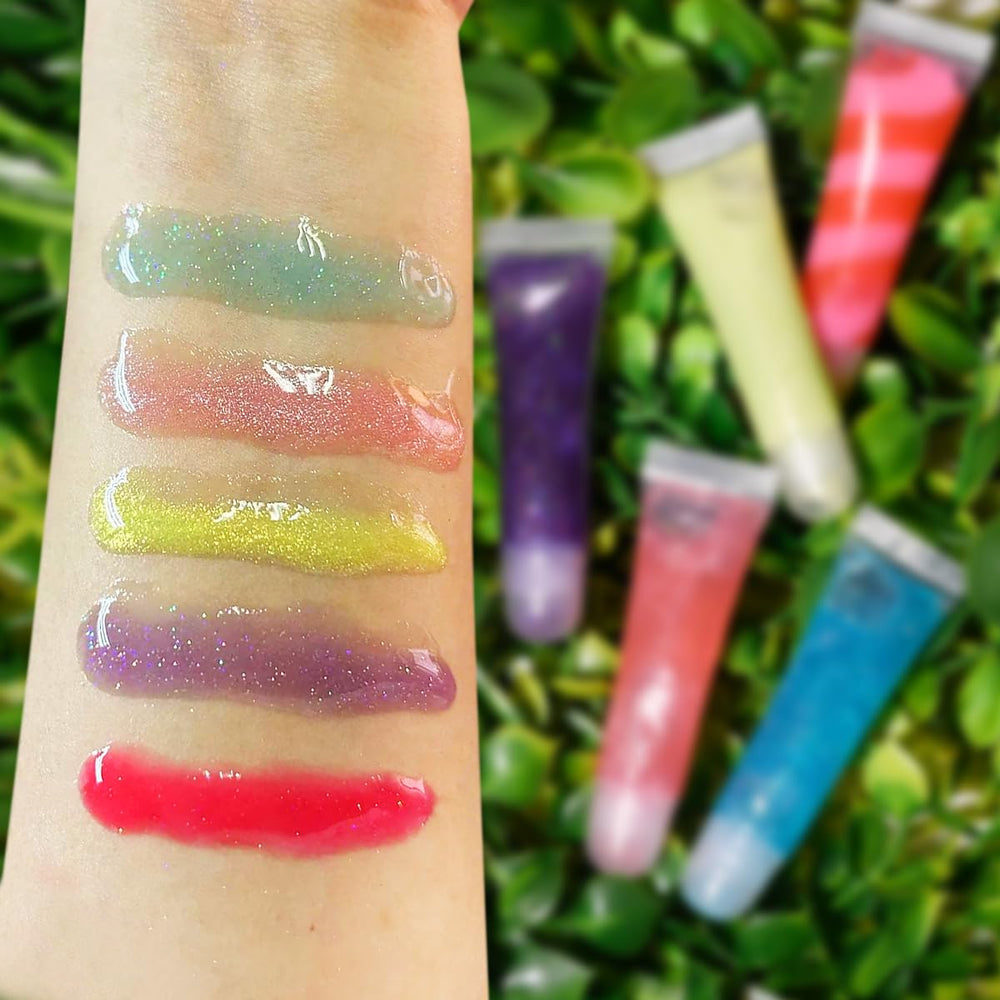 M&U Glitter lip gloss close-up swirl showing moisturizing shine.