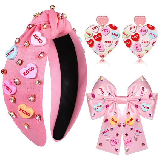 mokkia Valentine’s Day headband in pink with a knotted design for romantic outfits