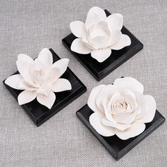 Decorative diffuser stones available in Magnolia, Lotus, and Rose styles