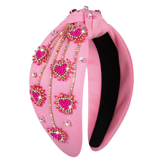 MOLOCH Valentine heartheadband with rhinestones adds subtle sparkle for special occasions.