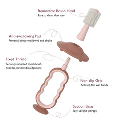 Baby toothbrush shown with suction base on surface