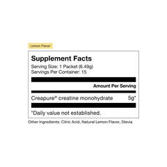 Close-up of lemon-flavored single-serve sachet from Momentous Creatine powder