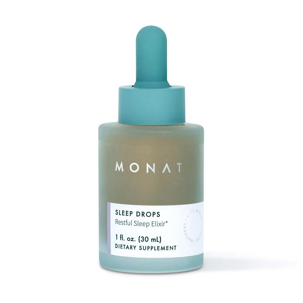 MONAT Sleep Drops bottle on nightstand ready for bedtime routine