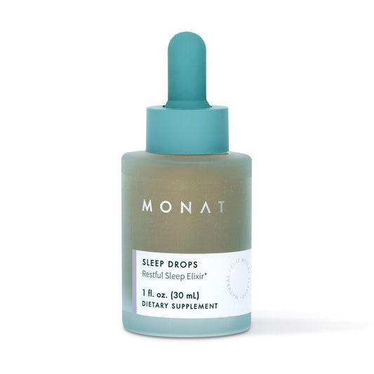 MONAT Sleep Drops bottle on nightstand ready for bedtime routine