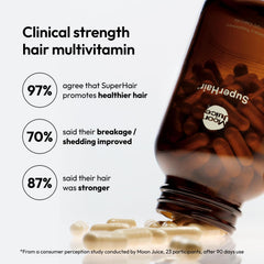 Moon Juice SuperHair bottle open with capsules ready for daily use.
