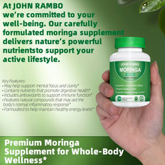 Capsules spilling from Moringa capsules bottle in hand