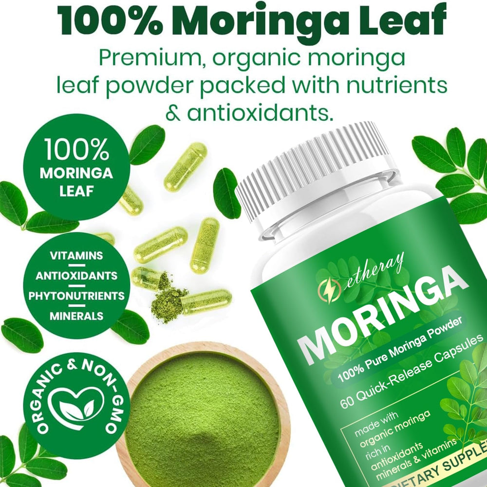 Green superfood bottle beside Moringa leaves