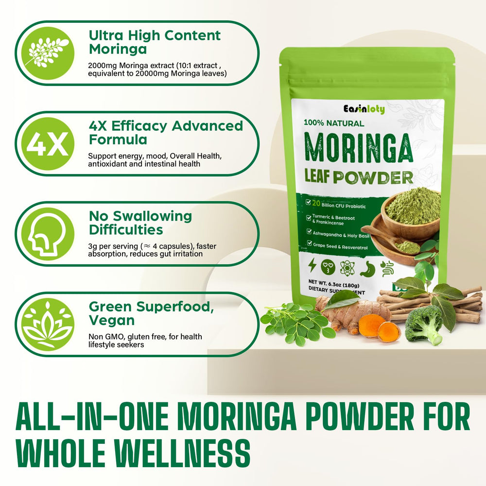 Serving scoop of moringa powder on wooden table
