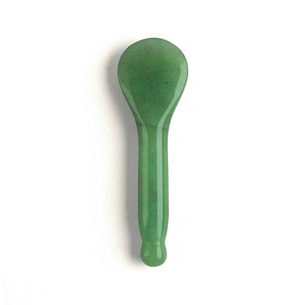Amethyst Gua Sha face tool close-up