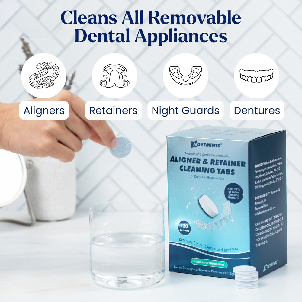 Dental appliances soaking in water with Movemints tablet